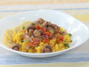 Lemon garlic mushrooms over mock saffron rice￼