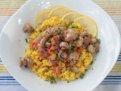 Lemon garlic mushrooms over mock saffron rice￼
