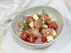 Salmon, tomato and cheese salad