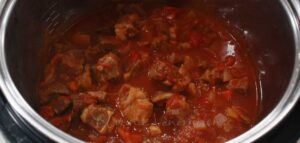 Beef and sauce in slow cooker