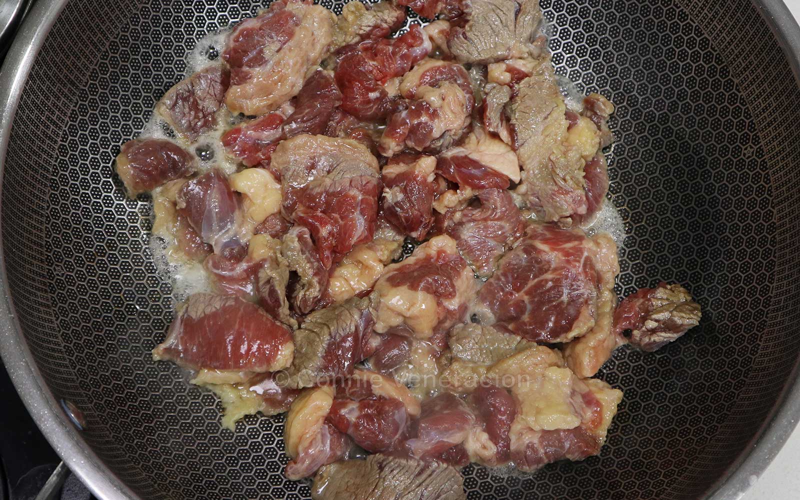 Browning thinly sliced beef