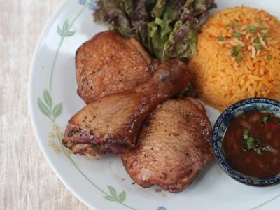 Guam-style oven-grilled chicken with annatto rice and fina'denne'