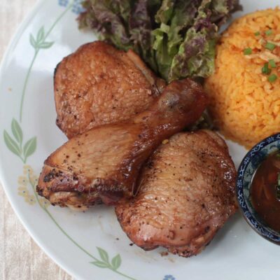 Guam-style oven-grilled chicken with annatto rice and fina'denne'