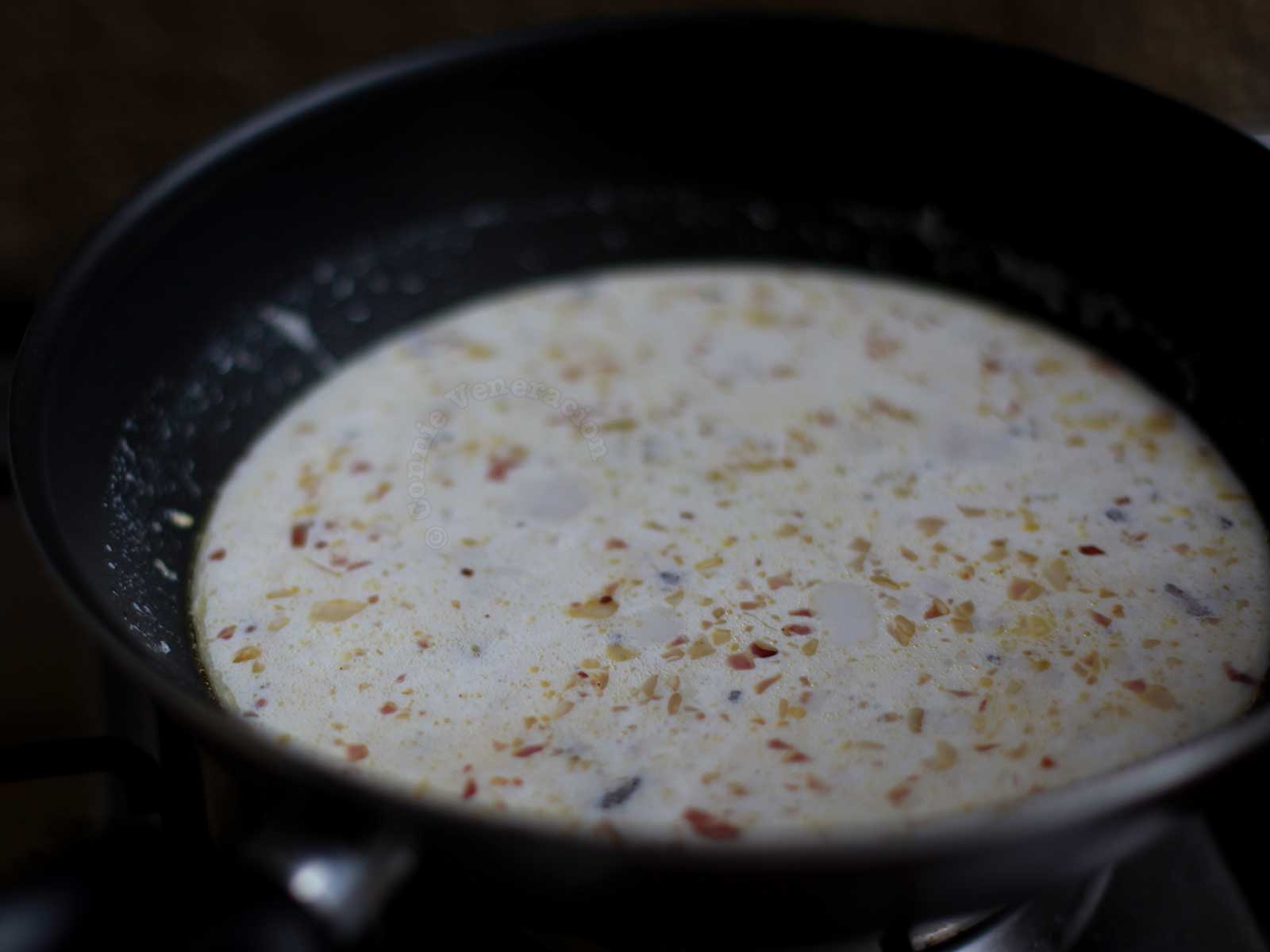 Rice cooking in yogurt and broth