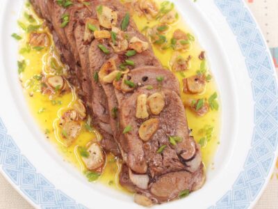 Lengua al ajillo (Spanish-style beef tongue with garlic)