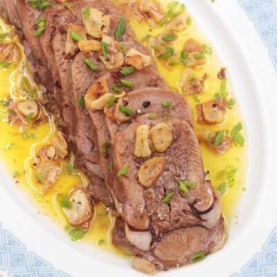 Lengua al ajillo (Spanish-style beef tongue with garlic)