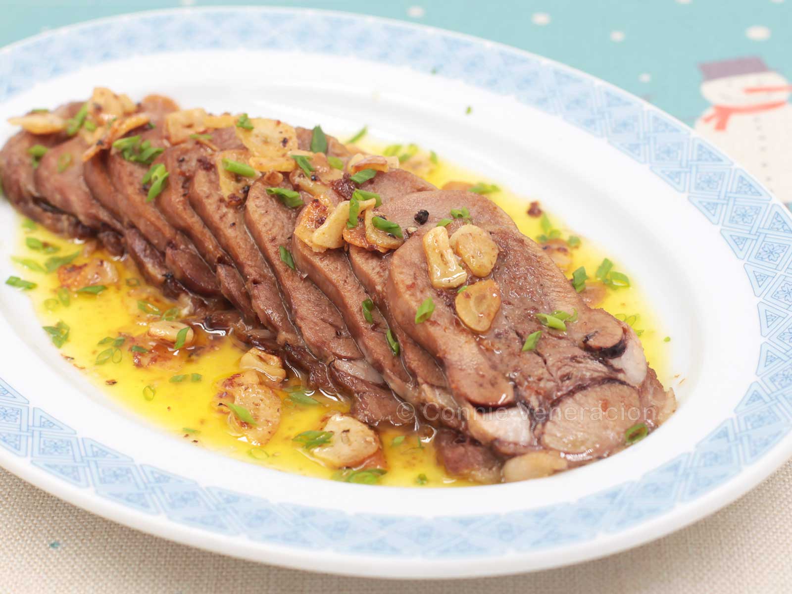 Lengua al ajillo (Spanish-style beef tongue with garlic)