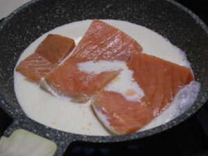 Poaching salted salmon in milk