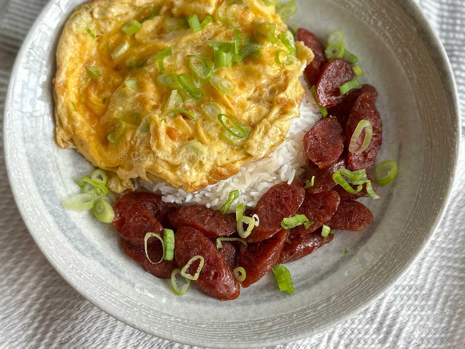 Chinese sausage, egg and rice breakfast