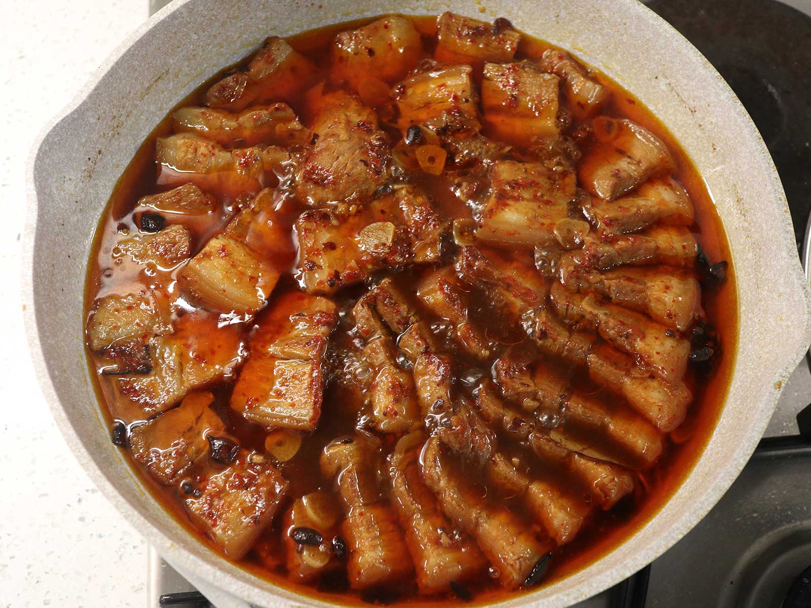 Fully cooked humba in pan