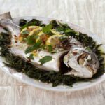 Steamed whole pompano with lemon and olive oil