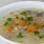 Chicken arroz caldo with immature chicken eggs