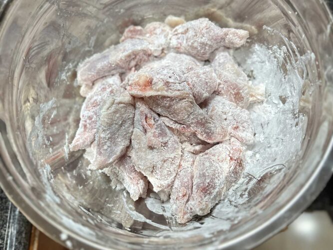 Chicken drumettes coated with potato starch