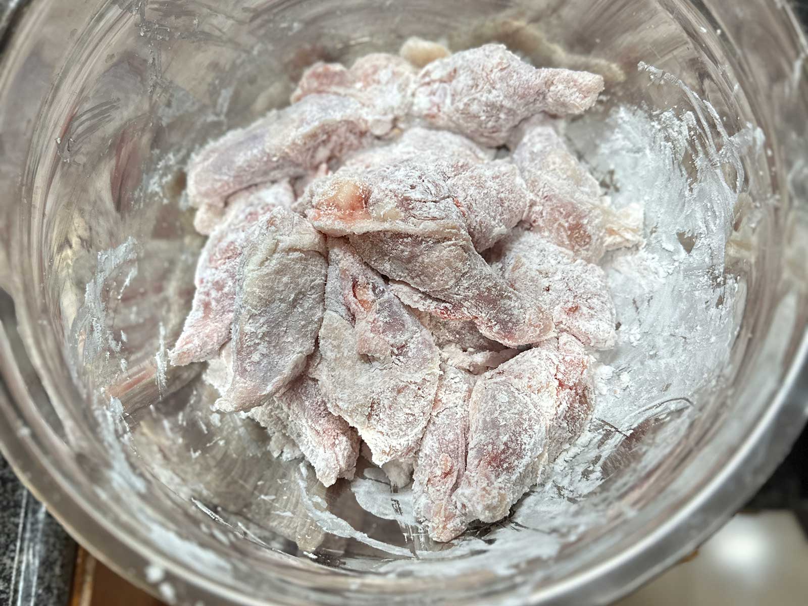 Chicken drumettes coated with potato starch