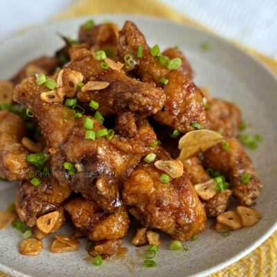 Fried chicken wings with honey adobo glaze