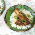 Lamb shank curry cooked in cider and coconut milk