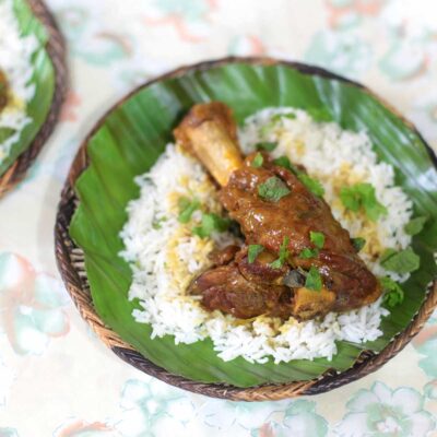 Lamb shank curry cooked in cider and coconut milk