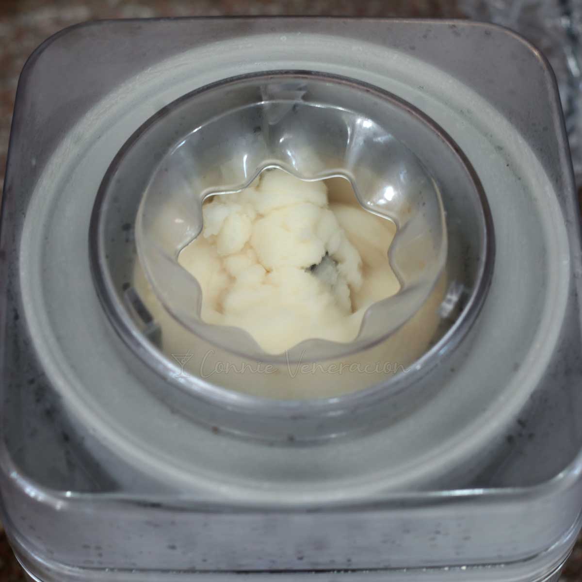 Making Coconut and lychee sorbet in an ice cream maker