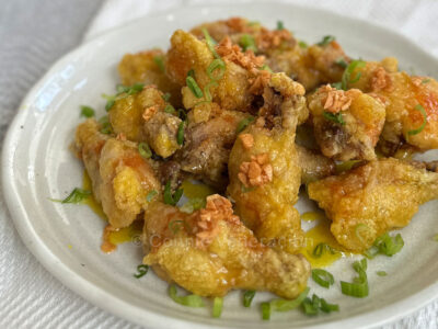 Fried chicken wings with lemon-orange glaze
