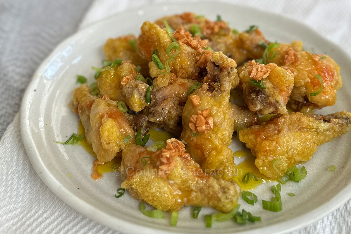 Fried chicken wings with lemon-orange glaze