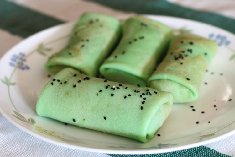 Pandan crepes with coconut and palm sugar filling (dadar gulong / kuih dadar)