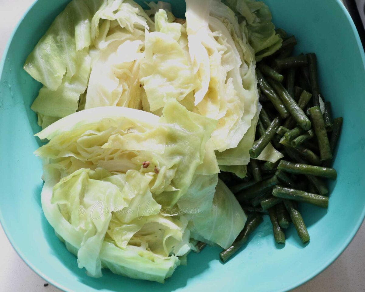 Cabbage wedges and sitaw in a bowl