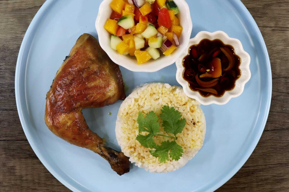 Chicken inasal with ensalada, dipping sauce and rice