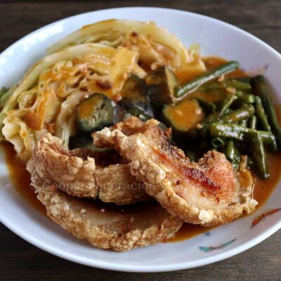 Crispy pork belly kare-kare