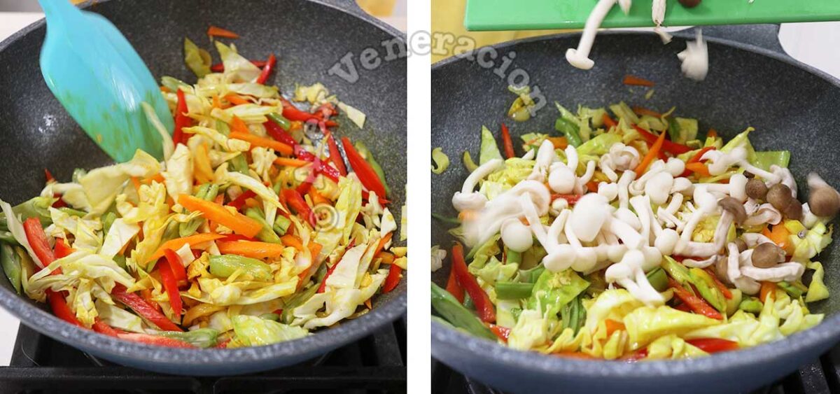 Adding mushrooms to stir fried vegetables in wok