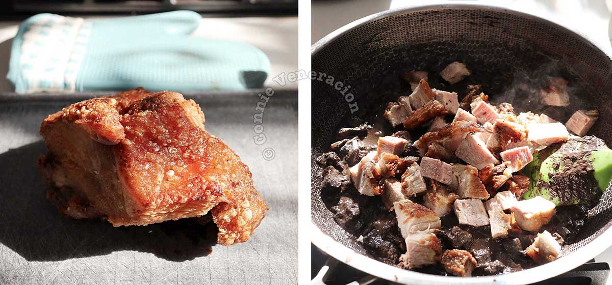 Adding cubes of crispy pork belly to the blood stew in the pan