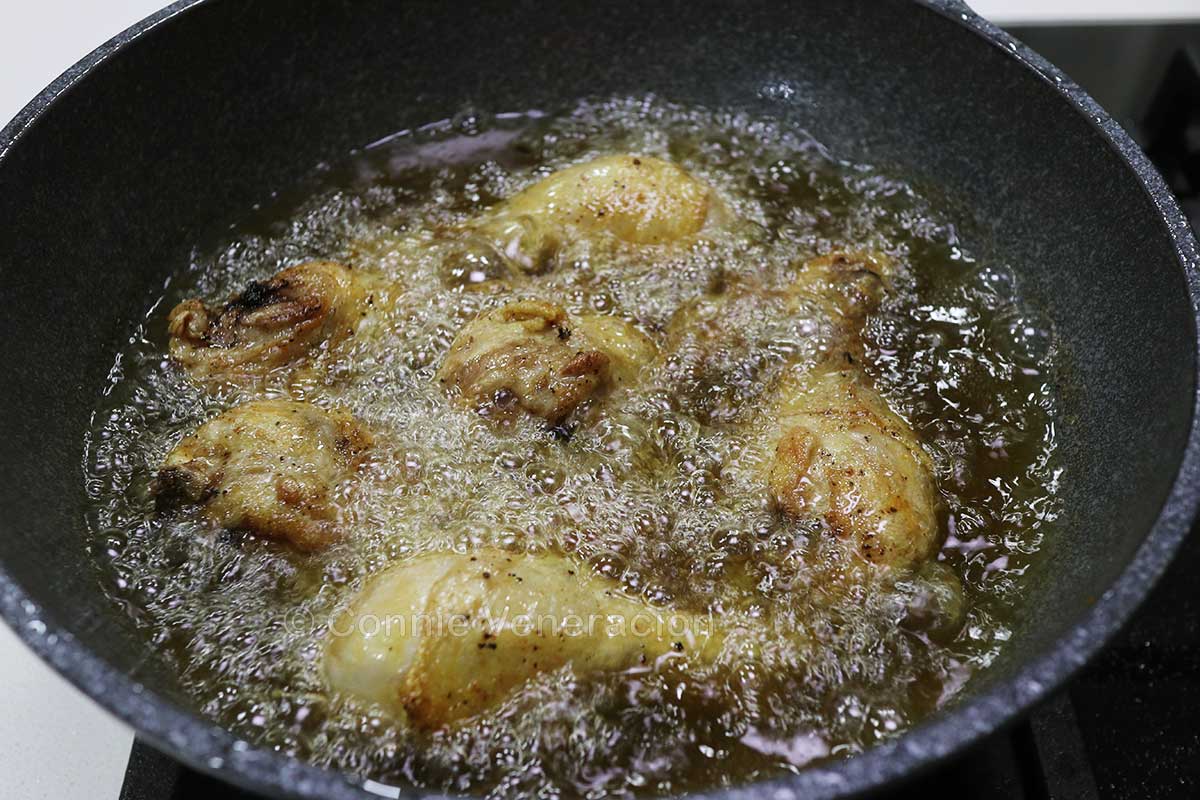 Frying chicken drumsticks