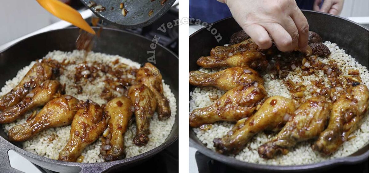 Arranging fried chicken over half-cooked rice in cast iron pan