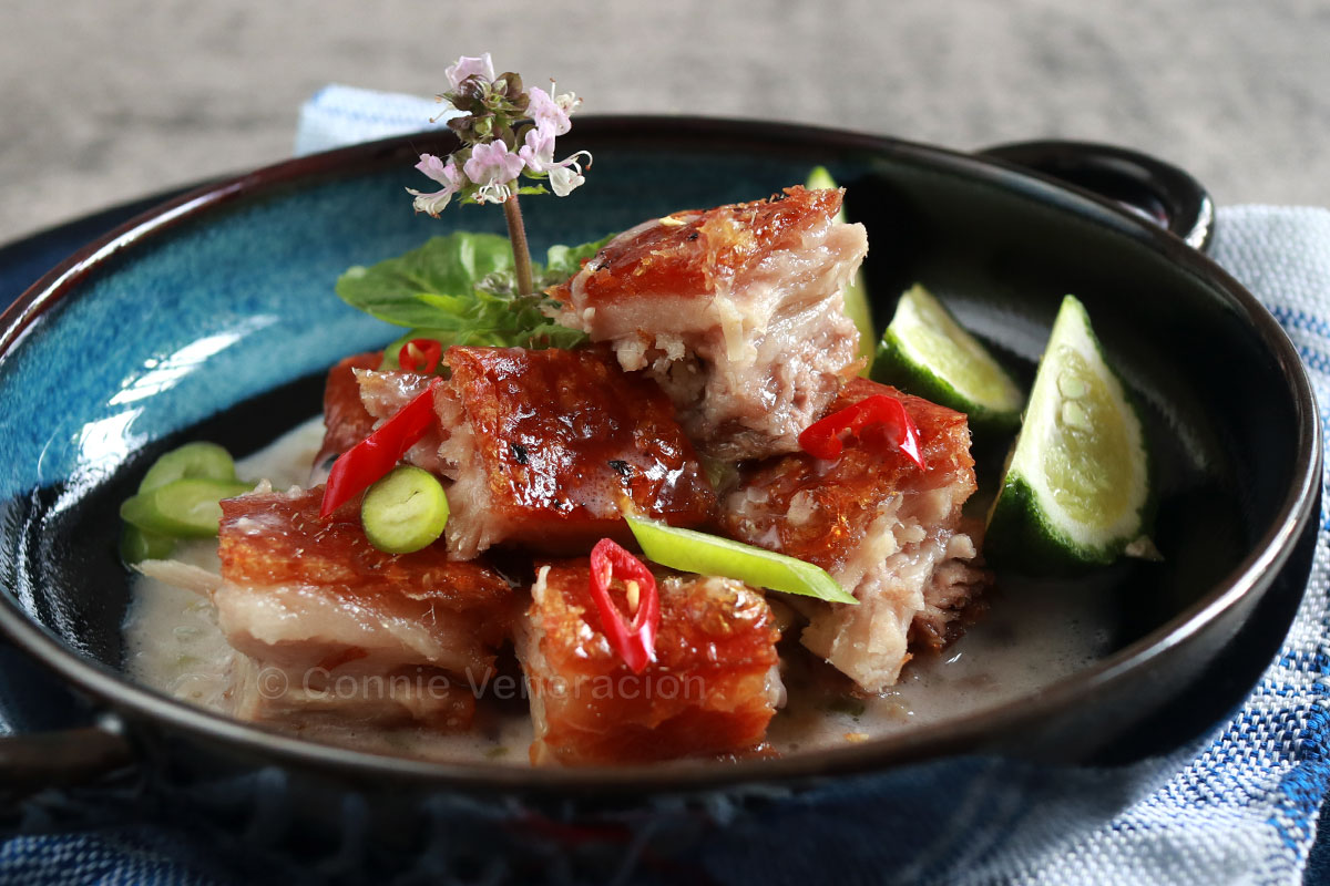 Crispy pork belly in coconut cream sauce