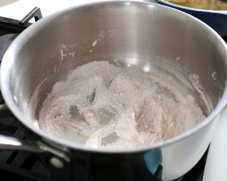 Toasting rice flour in a pan