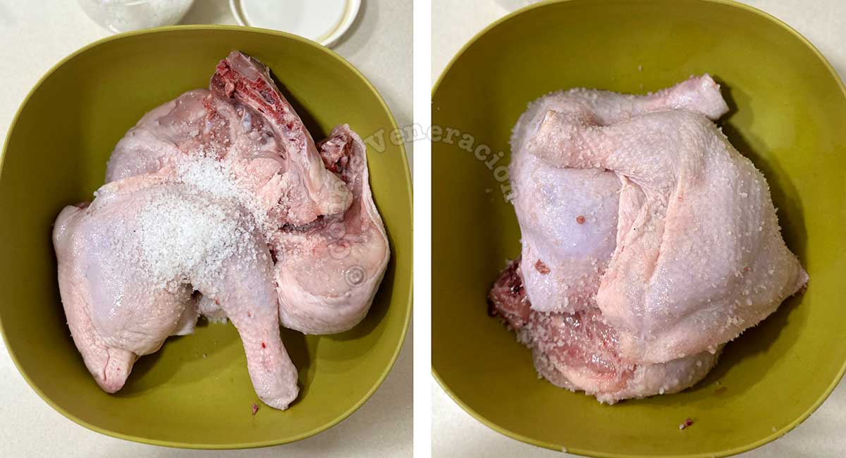 Rubbing chicken with rock salt