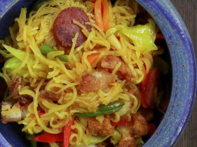Singapore noodles (curry bee hoon) with crispy pork belly