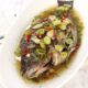 Steamed whole tilapia with ginger, chilies and scallions
