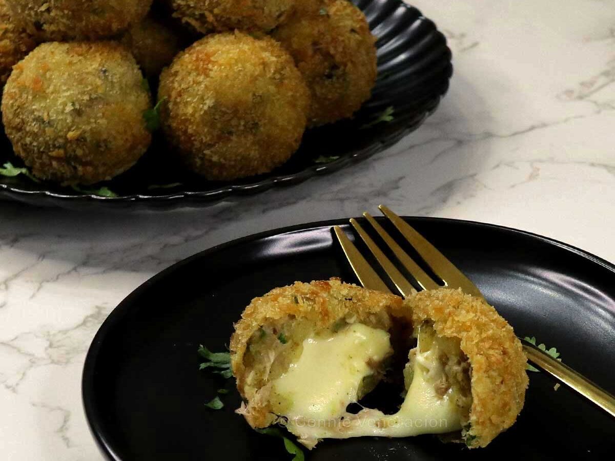 Cheese-stuffed tuna and potato balls