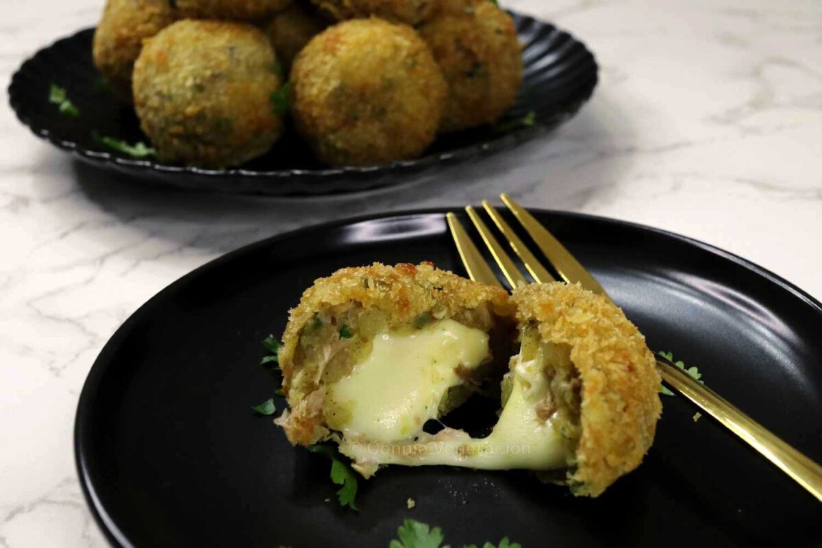 Cheese-stuffed tuna and potato balls