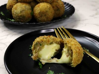 Cheese-stuffed tuna and potato balls