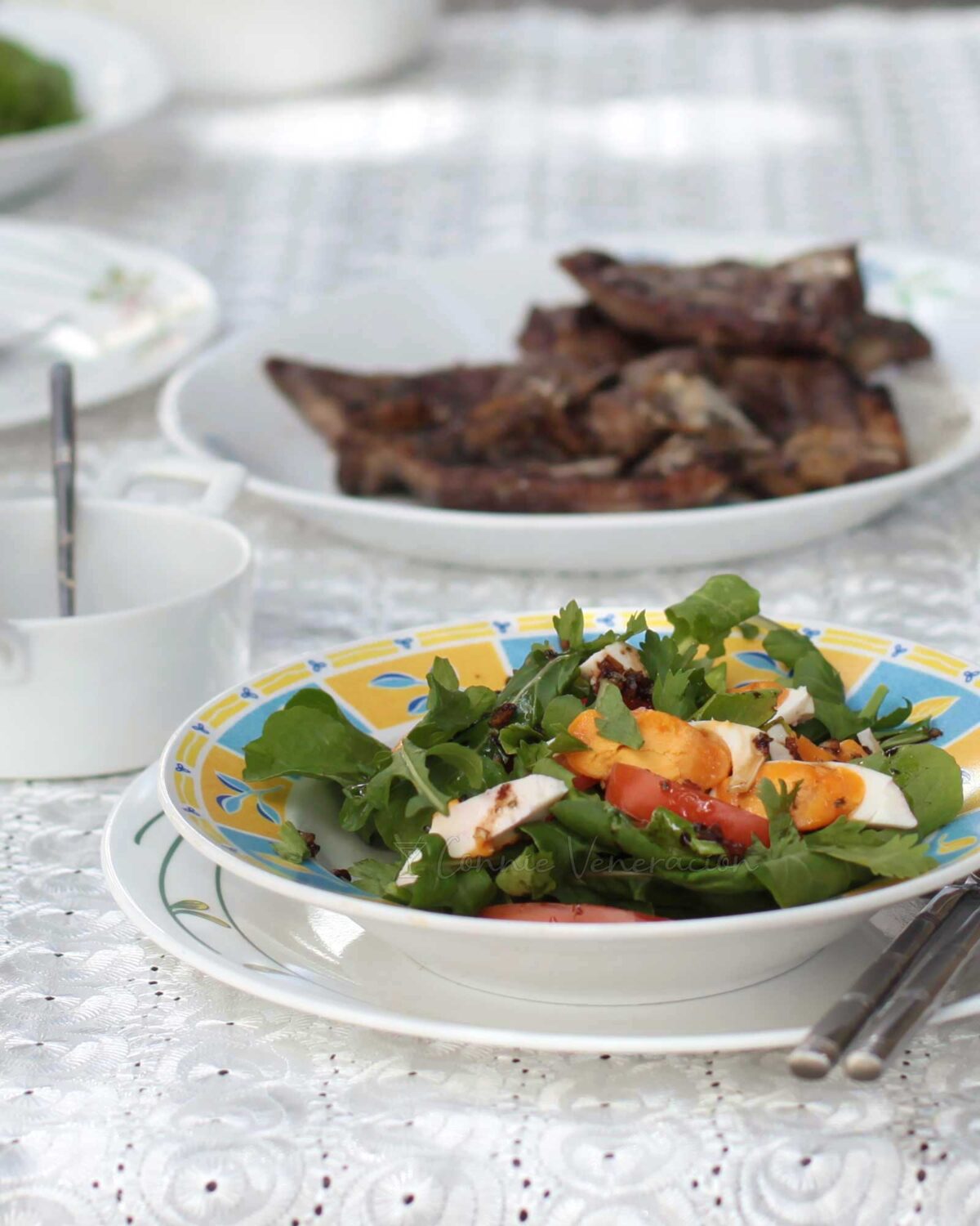 Arugula, tomato and salted duck egg salad with ginger vingaigrette