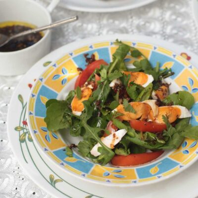 Arugula, tomato and salted duck egg salad with ginger vingaigrette