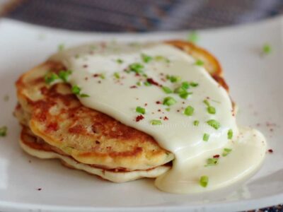 Bacon pancakes with cheese sauce