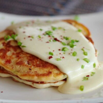 Bacon pancakes with cheese sauce