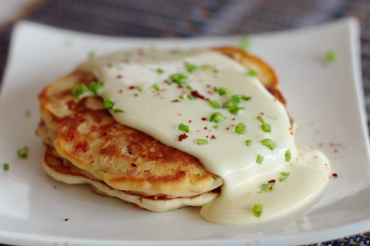Bacon pancakes with cheese sauce