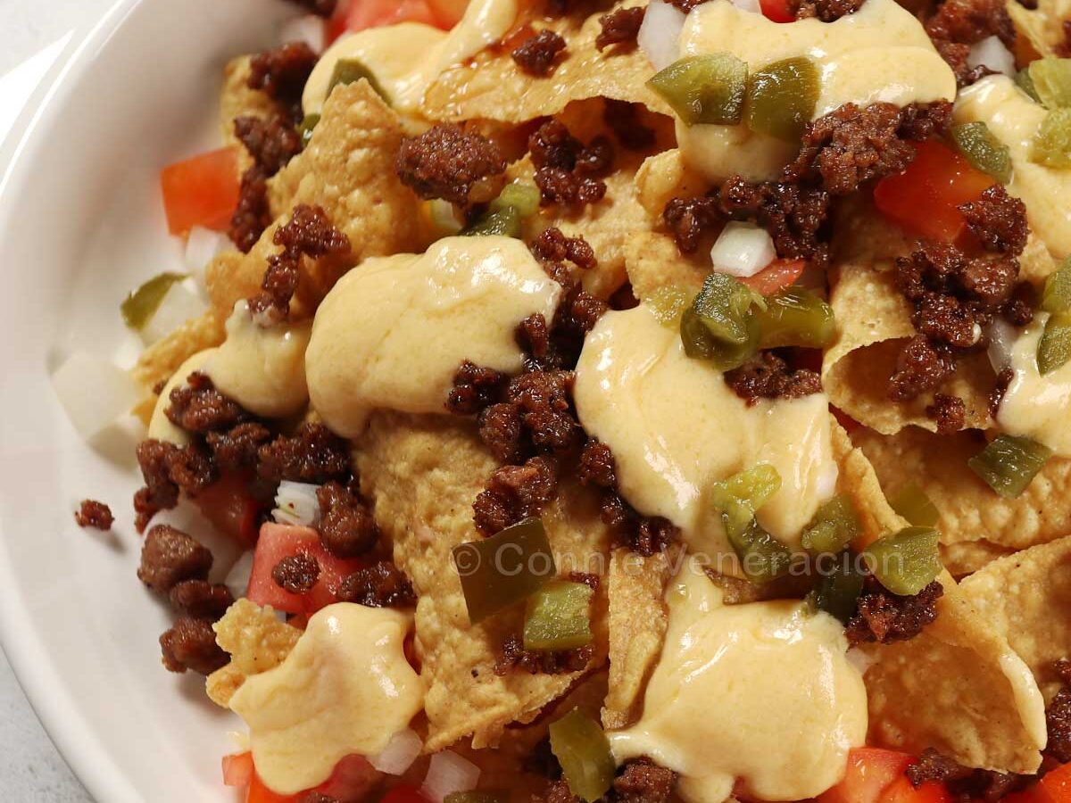 Spicy beef nachos with cheese sauce