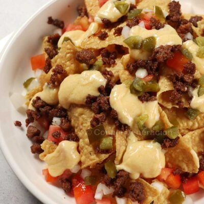 Spicy beef nachos with cheese sauce