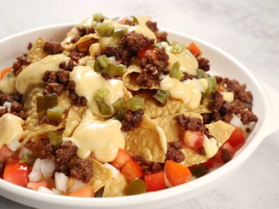 Spicy beef nachos with cheese sauce