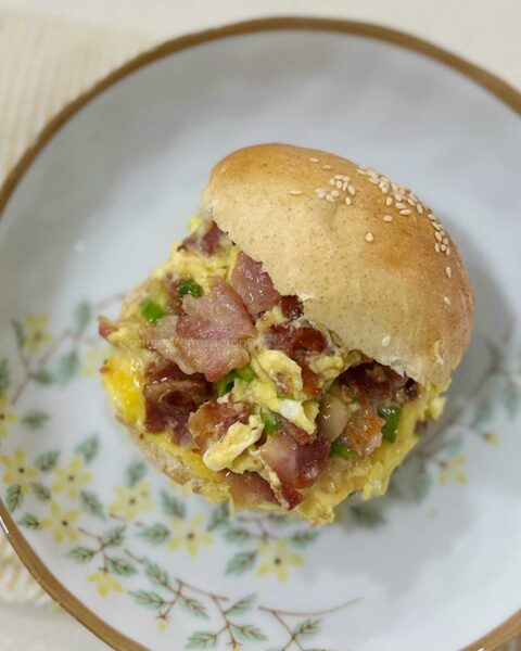 Scrambled eggs and bacon breakfast sandwich