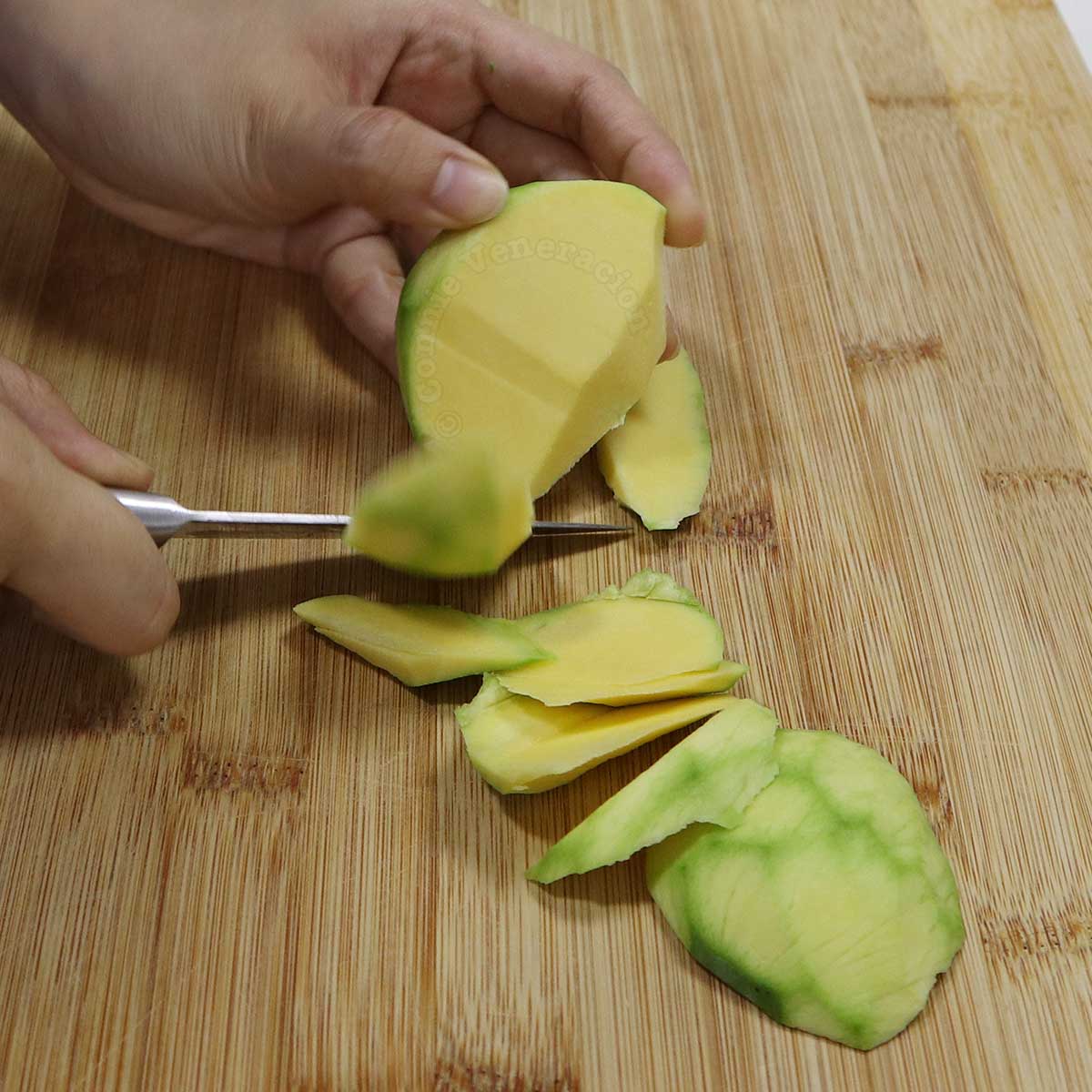 Cutting green mango